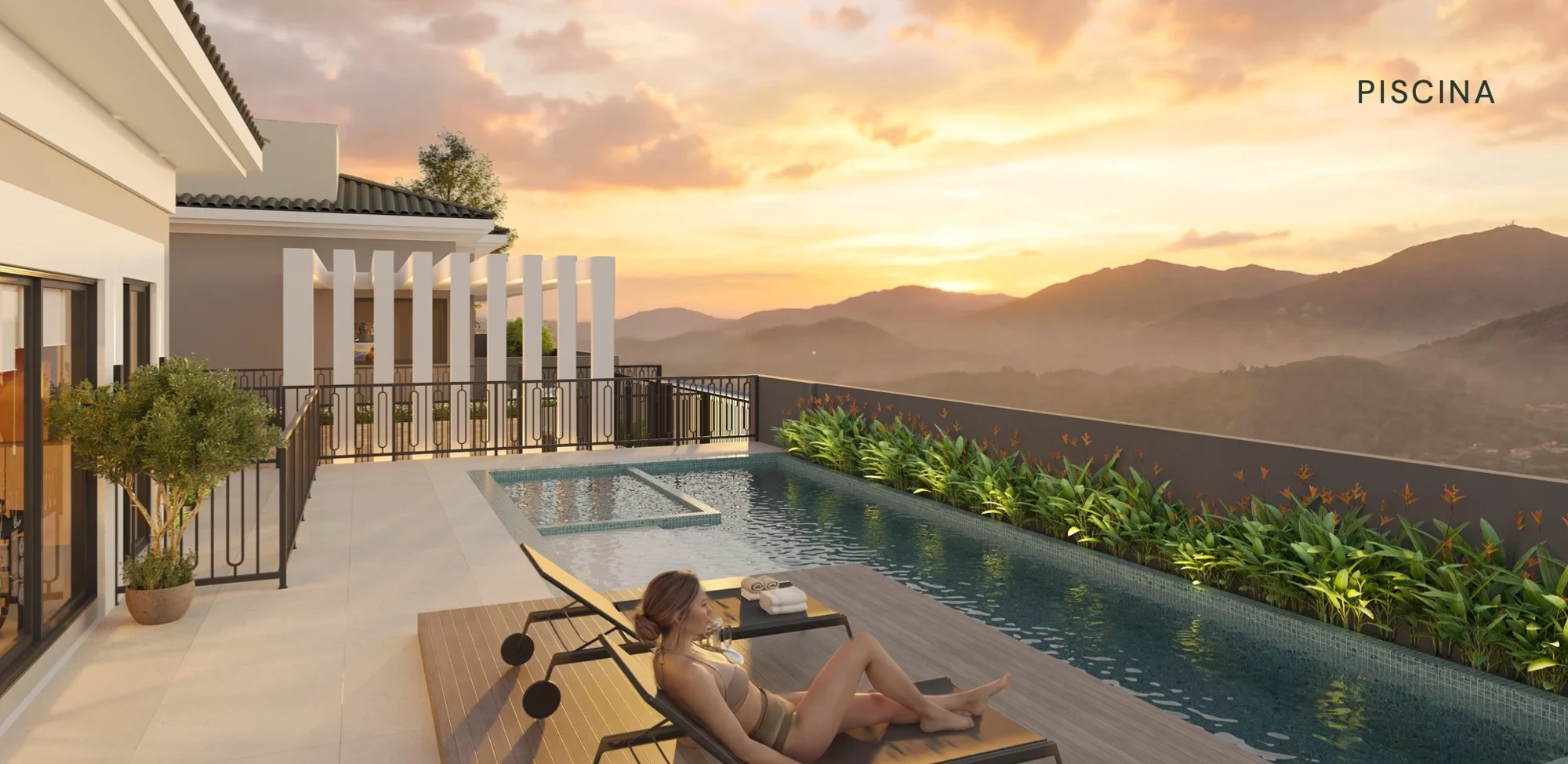 Perspectiva da piscina e do deck do Le Champ Village